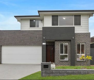 “Near New Modern Family Home” - Photo 2