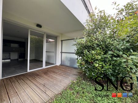 T2 AVEC JARDIN + 2 PARKINGS - Photo 5