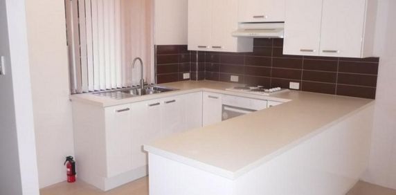 RENOVATED DELIGHT WITH AIR CON, DRYER & PRIVATE COURTYARD - Photo 2