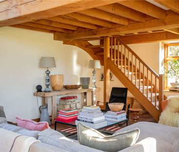 A beautifully presented 4-bedroom barn conversion with gated entran... - Photo 5