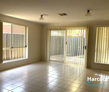 Spacious Family Home with Dual Living Areas and Double Garage - Photo 1