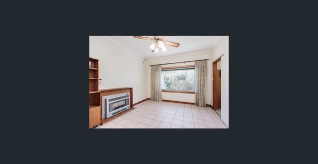 Charming Home Well Presented Classic Family Home 2 Brm with Office or 3rd Brm with ceiling Fans.Gas Top Cooker Tiled and Polished Wooden Floors. - Photo 1