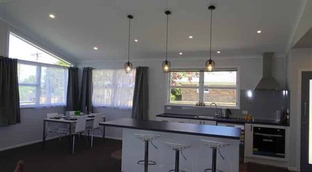 Warm & Welcoming Three-Bedroom Home with Double Garage - Photo 2