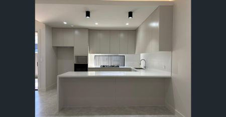 A beautifully designed family home, just an approximate 3-minute drive to Melonba Public School. - Photo 3