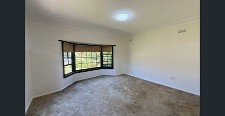 FRESHLY PAINTED, FAMILY HOME SET IN A QUIET STREET - Photo 2