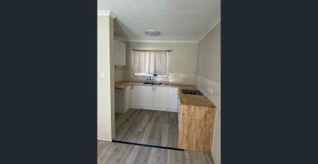 Convenient Southport Living – Quiet Street, Great Location! - Photo 2