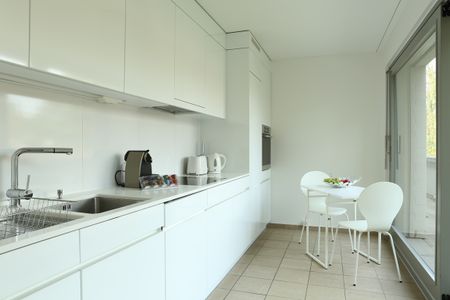 Moderne 4.5-Zimmer-Attikawohnung auf dem Bruderholz - Foto 3