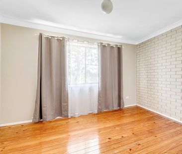 Charming 2-Bedroom Unit with Spacious Courtyard in Prime Location - Photo 2