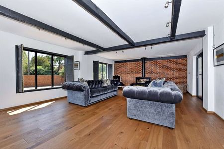 A very high specification and architecturally designed house with large private garden in the sought after village of Maidens Green. - Photo 3