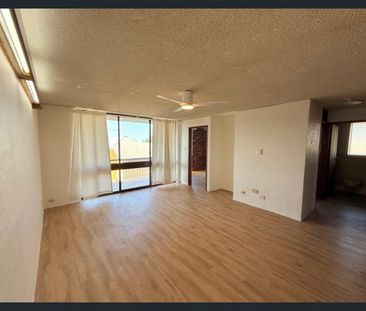 Convenient and Cozy Low Maintenance Unit! - Photo 1