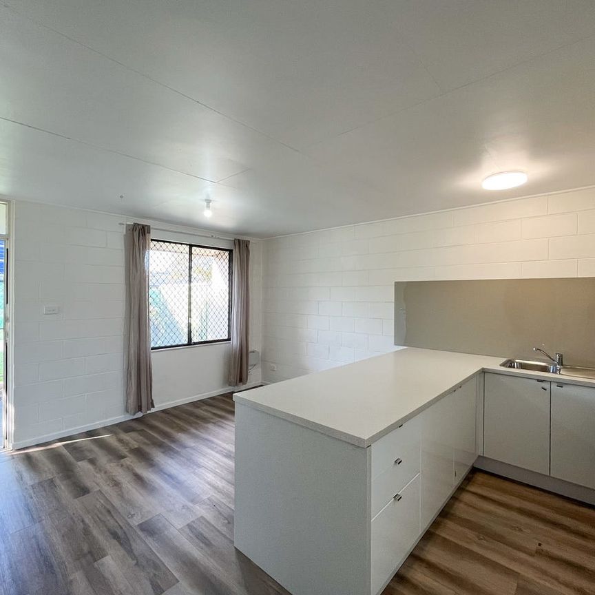 CONVENIENTLY LOCATED WITH GOOD SIZED YARD - Photo 1