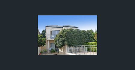 Freshly Painted 2-Bedroom Townhouse in a Prime Coastal Location - Photo 4