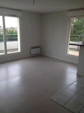 Location Appartement 4 pièces 73m² - Photo 3