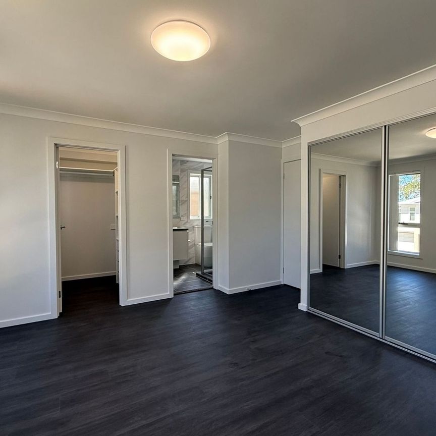 Brand New 4 Bedroom Home, Located in Austral! - Photo 1