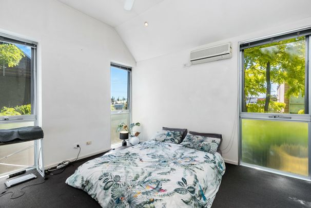 Register to Inspect // Light-Filled Town Residence with Private Courtyards and Secure Parking - Photo 1