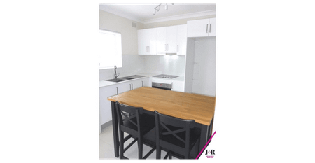 Updated & spacious two bedroom unit in a security block - Photo 2