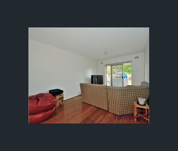 BEACHSIDE LIVING IN PRIME LOCATION - Photo 1