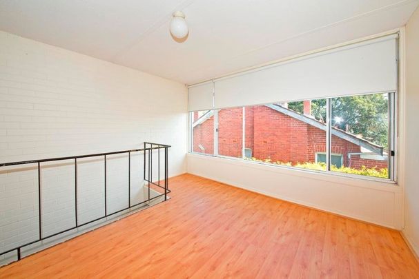 Two Storey Apartment – Light & Bright! - Photo 1