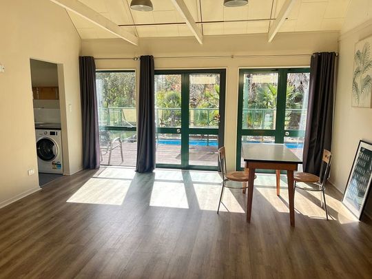 Charming 2BR Unit with Garden! - Photo 1