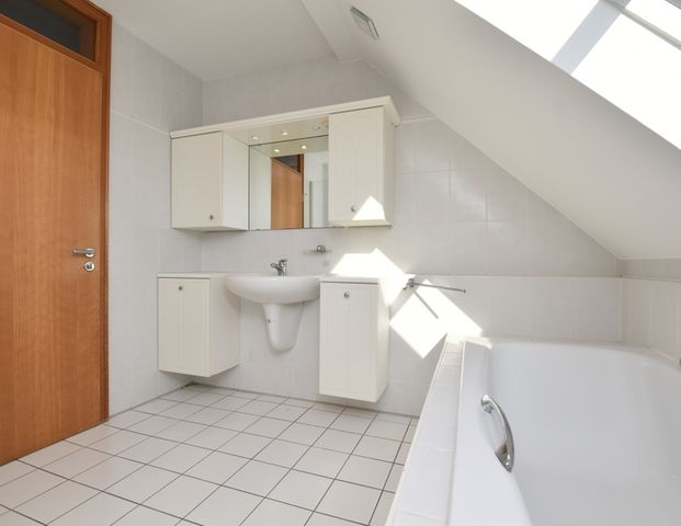 Wohnen im Herzen von Friesoythe - Dachgeschosswohnung mit Einbauküche und Balkon - Foto 1