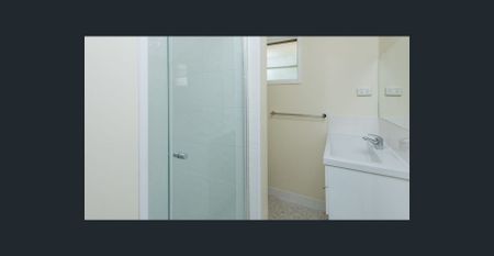 NEAT AND TIDY UNIT WITH COURTYARD - Photo 2