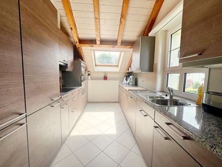 Appartement de 6,5 pièces en attique à Savigny - Photo 2