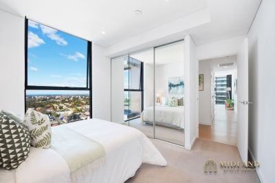 Stunning Two-Bedroom Penthouse with Breathtaking Water Views - Photo 2