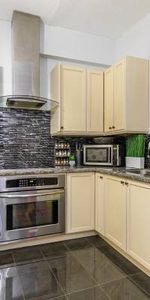 Gorgeous 2 Bedroom plus 1 Bathroom with Gourmet Kitchen and Private Te - Photo 4