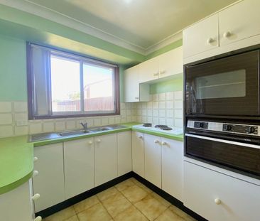 Brick Family Home | Quiet Location - Photo 6