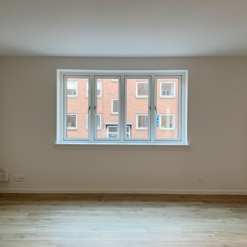 <b>Lys og delevenlig 3-værelses på 77 m2 med moderne køkken og parkering</b><br> - Photo 1