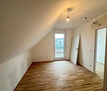 Modernes Wohnen in Brigittenau - 4-Zimmer-DG-Wohnung mit drei Freif... - Photo 4