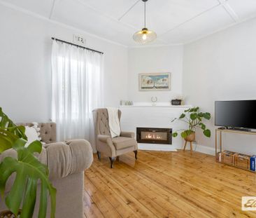 Welcome to Sunshine Cottage - Where Classic Charm meets Modern Luxury - Photo 2