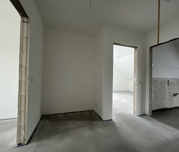 Vermietung: Erstbezug, moderne Obergeschosswohnung mit Balkon und C... - Foto 1