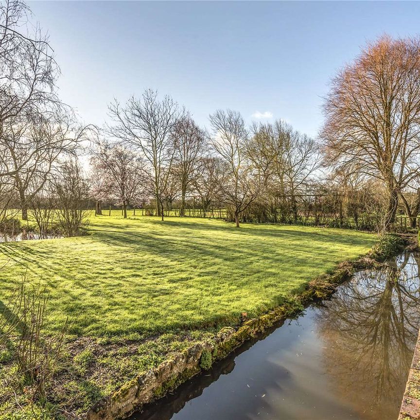 A charming and characterful home set in beautiful gardens with views across open countryside - Photo 1