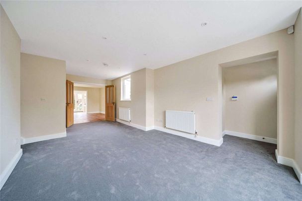 A beautifully presented three bedroom character property in a prominent central village location. - Photo 1