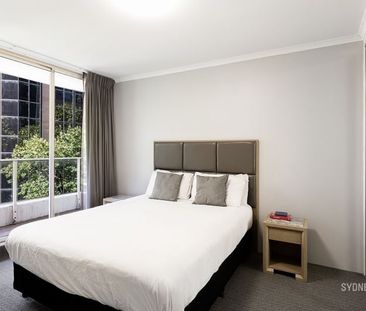 Large Updated Two Bedroom | Furnished - Photo 2