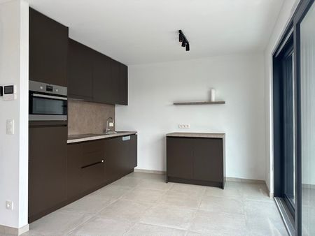 Dit prachtige nieuwbouwappartement met 1 slaapkamer. - Photo 4