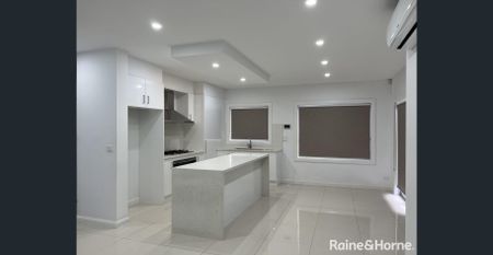 Modern Living in a Thriving Location! - Photo 5