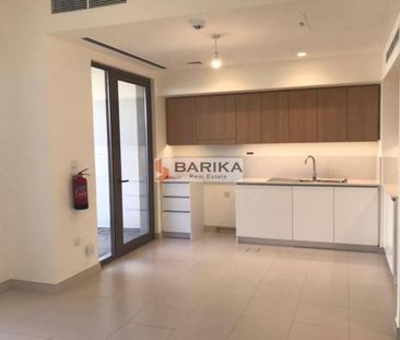 Elegant 3BR + Maid | Private Garden | Pool Access - Photo 1