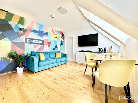 Stilvolle Dachgeschossresidenz mit hochwertiger Ausstattung und urbanem Wohnkomfort | ZELLMANN IMMOBILIEN - Photo 1