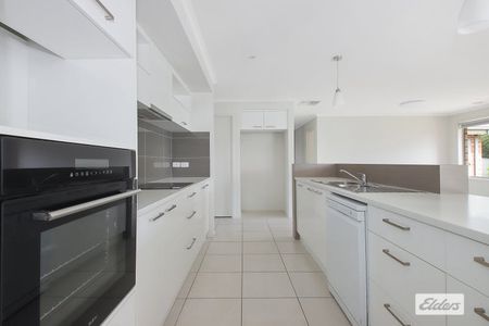 Spacious 4-Bedroom Family Home with Modern Comforts and Solar Power - Photo 5