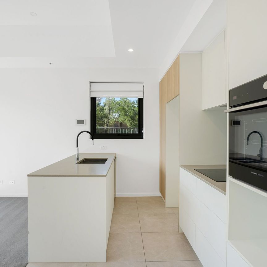Light-Filled Corner One-Bedroom with Generous Private Courtyard - Photo 1
