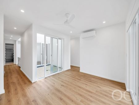 Open the Door to Brand-New Family Living with Dual Living Zones - Photo 5