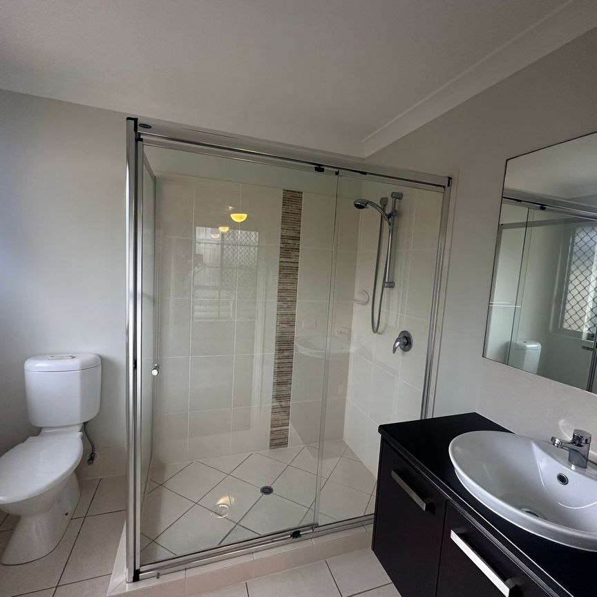 Comfortable and Convenient 4-Bedroom Family Home - Photo 1