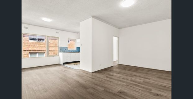 Light-Filled 2-Bedroom Apartment with Enclosed Balcony - Photo 1