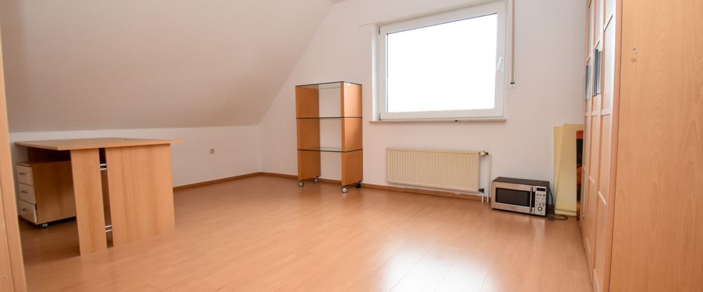 Dachgeschoswohnung mit Garage in ruhiger Siedlungslage in Markhausen - Foto 1