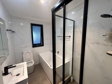 BEAUTIFULLY RENOVATED 4 BEDROOM HOME - Photo 5