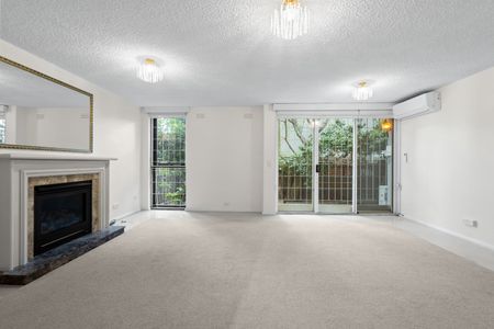 Superbly Located Two Bedroom Apartment With Parking For One Car! - Photo 4