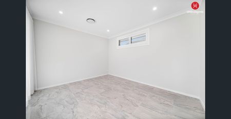 Stunning 5-Bedroom Family Home with Luxury Features - Photo 4