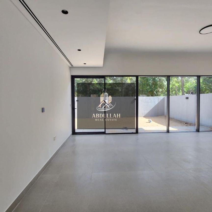 Family Townhouse in Tilal City with Shared Pool - Photo 1